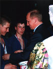 Награждение чемпионов. 
В. Путин вручает медаль А. Метелькову